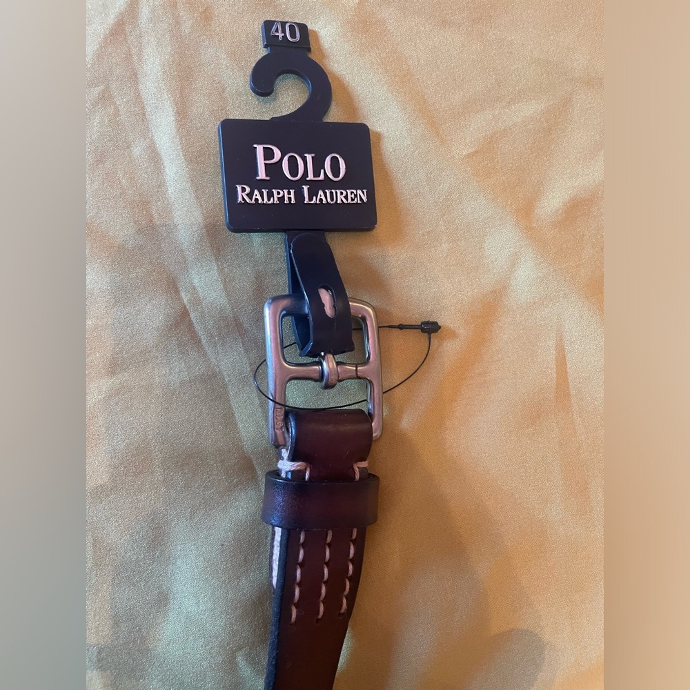 Polo Ralph Lauren classic brown belt. 40” wdth 1” Silver buckle/brown leather.